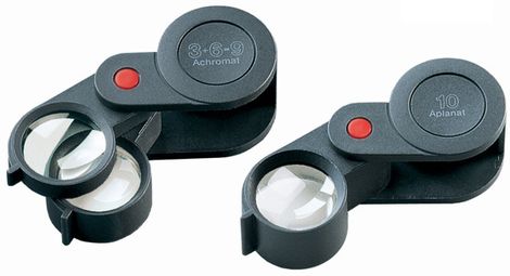 Jo[y -folding plastic magnifiers